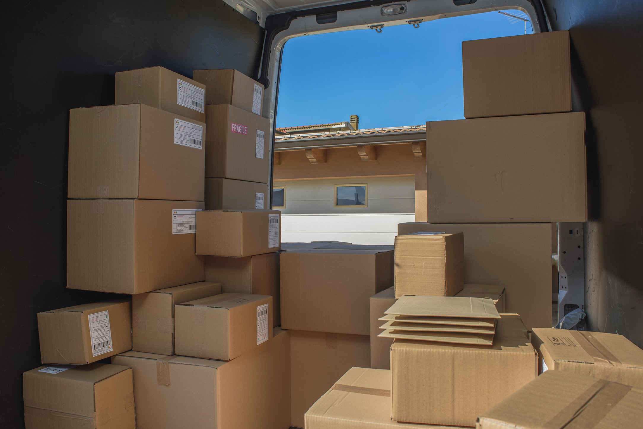 Courier Service Delivery Van Filled with Packages